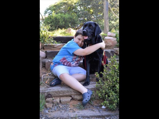 Conrad Foot with his best friend, Lorenzo, who was trained for two years to become Conrad's companion.