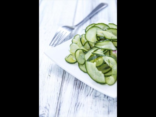 Thinly sliced baby marrow salad with a salty edge.