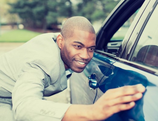 42813850 - excited young man and his new car