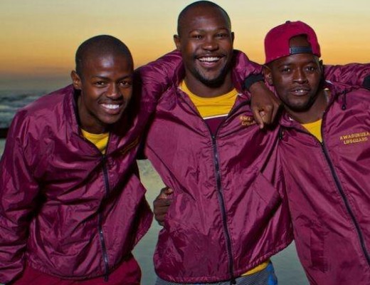 Bongani Xulu (centre) with two of his fellow lifeguards.