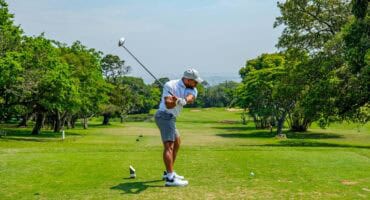 Nashlin Naidoo takes aim at the green.