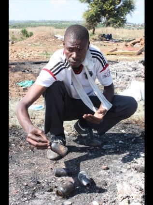 EFF member, Eddie Mathiba, saying metro police burnt down his shack in "Malemaville" on Tuesday afternoon.
