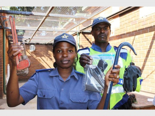 Traffic Officers Patience Mabasa and Oupa Baloyi seized house-breaking equipment and three unlicensed firearms on Friday. PHOTO: Ron Sibiya