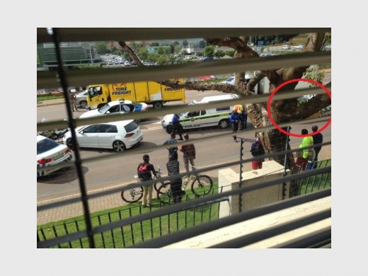 A witness took these pictures of the episode, clearly showing marked Tshwane metro police vehicles. Photo: Ria David.