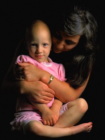 Original caption: A young cancer patient and her mother after chemotherapy treatment. --- Image by © David Scott Smith - The Stock Co/Science Faction/Corbis