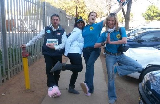 Fun on Slipper Day: Mr Paul Fouchee, (Brooklyn SAPS CPF Chairperson), Brigadier Kushie Nair (Station Commander), Constable Vinette Volschenk and Captain Colette Weilbach Photo: supplied.