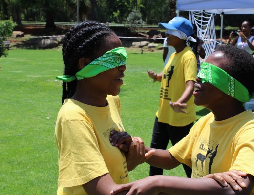 Children playing communication sound game at the Pretoria Zoo.