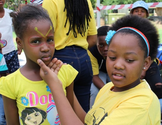 Pretoria Zoo club member, Goitse Ramaselela painting a child during the Halloween fun Day.