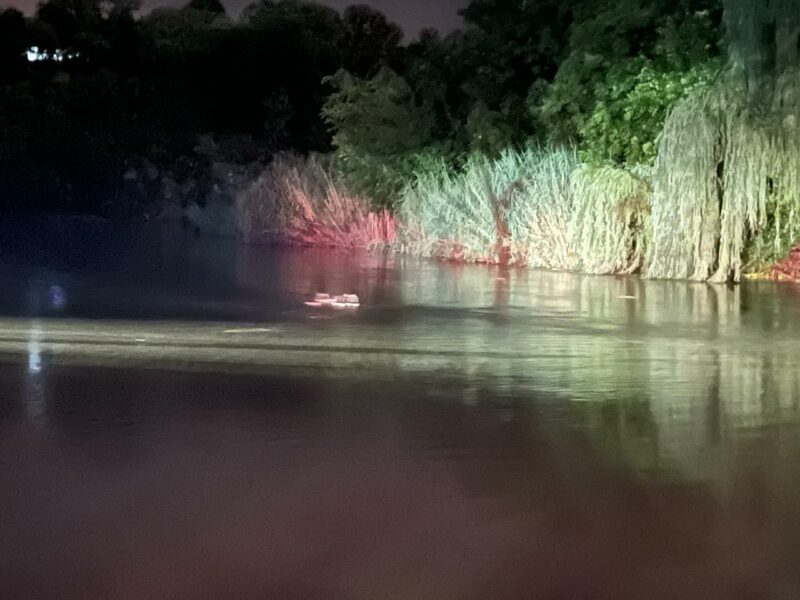 Search on after car 'swept by water into North river'