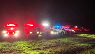 Search on after car 'swept by water into North river'