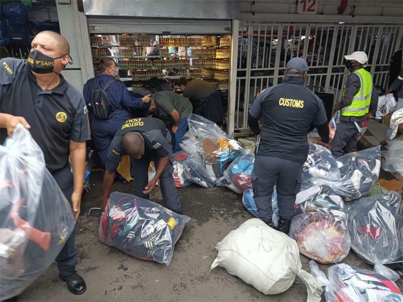 Five arrested in retail store armed robberies