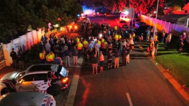 Community mourns slain hero