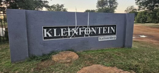 Residents fix the Kleinfontein signs. Photo: Facebook/Kleinfontein.