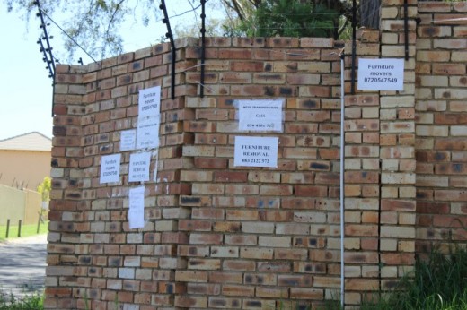 Illegal wall adverts are a concern.