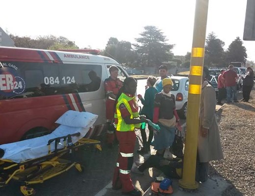 The injured woman rests after the accident.