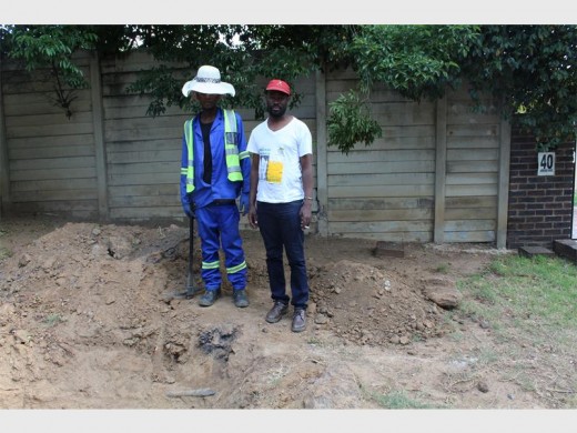 Katlego Lekalakala and Joburg Water community liaison officer Amos Koikoi.
