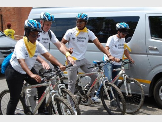 WWF South Africa CEO, Morné du Plessis, rides bicycle through the City with Maps Maponyane joined by EcoMobility supporters.