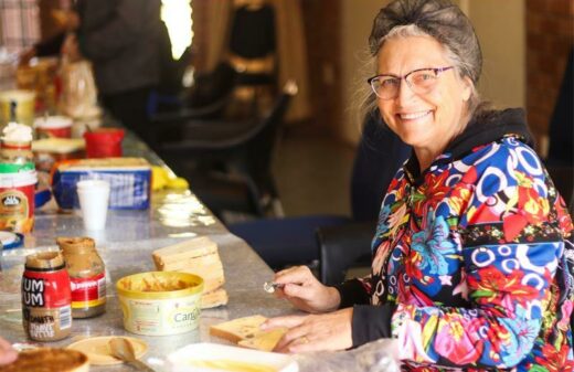 Harriet Botes butters some sandwiches. Photo: Neo Phashe
