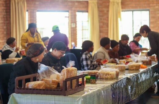 Members of the community gathered at Linden Police Station to help with Mandela Day activities. Photo: Neo Phashe