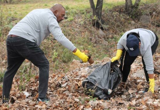 Alvin Munsamy and Isha Moodley make their community cleaner. Photo: Nicholas Zaal