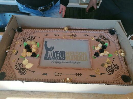 Oasis Haven receives a large cake on Mandela Day. Photo: Nicholas Zaal