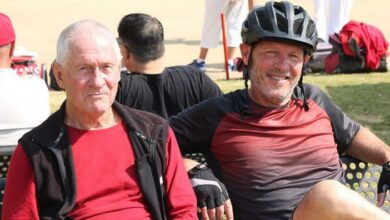 Bryan Carrie and David Graham watch some bowls. Photo: Nicholas Zaal