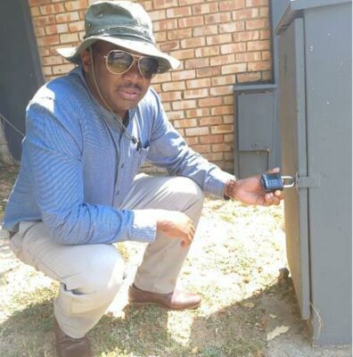 City Power planned manager Simphiwe Makupula places a lock on an open box in Sundowner.