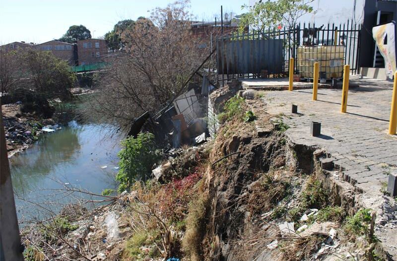 Ward 104 councillor Emi Koekemoer and Sean Kreusch assess the state of the bridges and road infrastructure