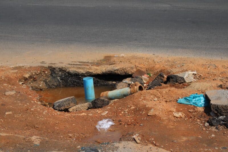 With the rainy season approaching, residents warn that a large pothole on Bram Fischer Drive could cause accidents and injuries, questioning the city’s costly upgrade project.