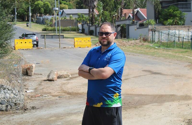 Ward 134 councillor Devon Steenkamp urges residents to sign petition to help slow down the crime at the Boskruin Community Centre.