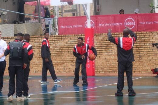 Basketball players warm up on the court after heavy morning rains at the St Stithians U16 Basketball Tournament. Photo: Photo: Nkazimulo Ncube