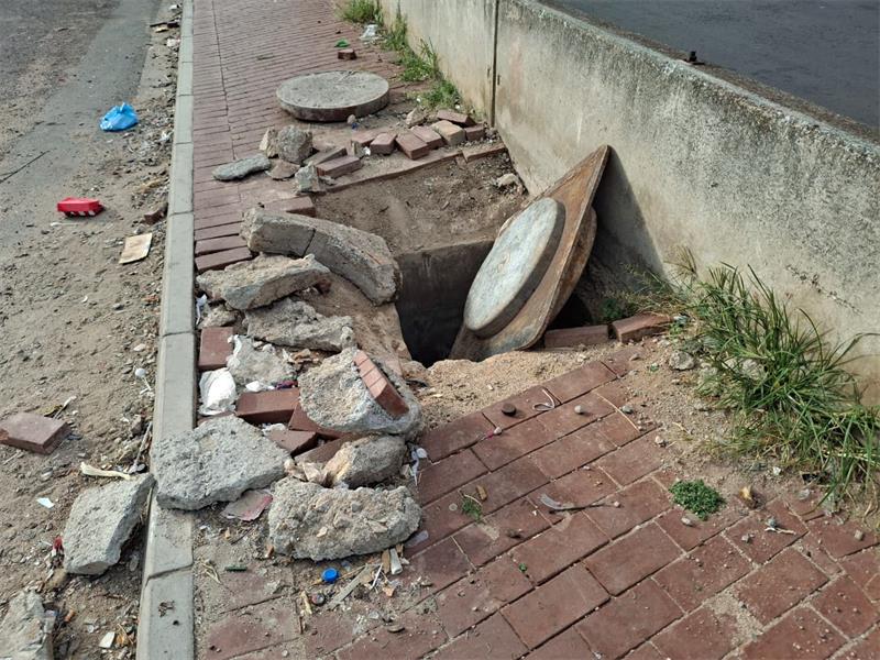 Dangerous open manholes and broken bricks on Jan Smuts Avenue have left locals worried about pedestrian safety and the risk of scrap metal or cable thieves striking.