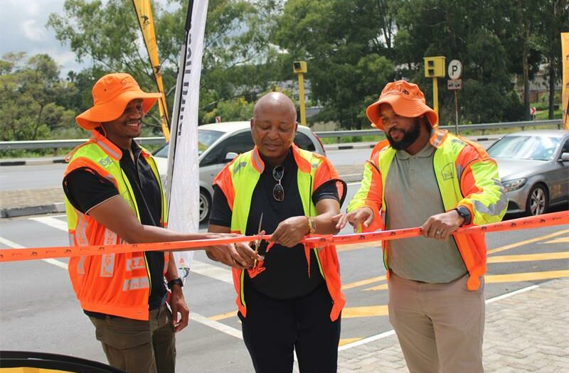 Road is open again, but it took a pipe burst, a protest birthday party, an unpaid contractor, and a television exposé to make it happen.
