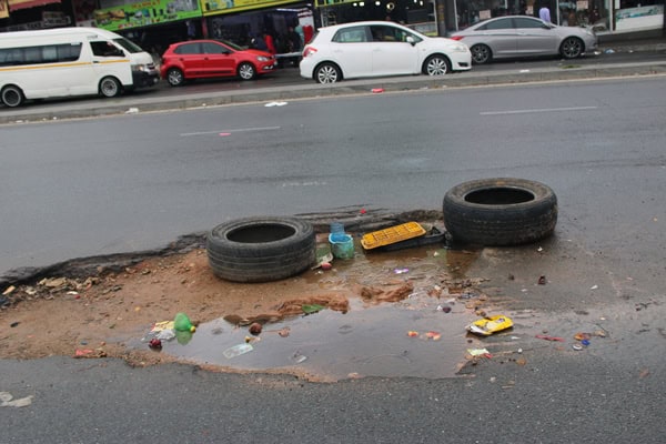 The tyres are still there, the water is still rising, and Joburg Water is still not talking. A month after the Randburg Sun's last report, nothing at Bram Fischer Drive has changed.