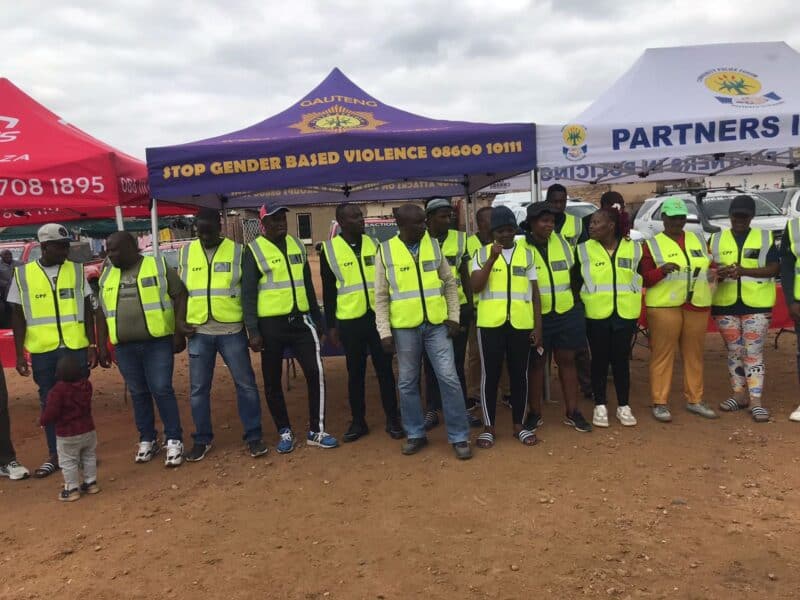 Residents rally behind newly introduced community patrollers in Kya Sands pipeline informal settlement.