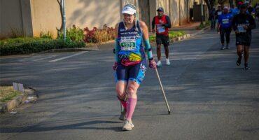 Nita Oberholzer runs with her crutches. Photo: Supplied