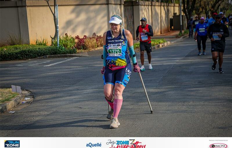 Nita Oberholzer runs with her crutches. Photo: Supplied