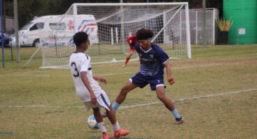 A tense individual battle unfolds near the box, with the RESA man trying to dribble past his marker. Photo: Nkazimulo Ncube