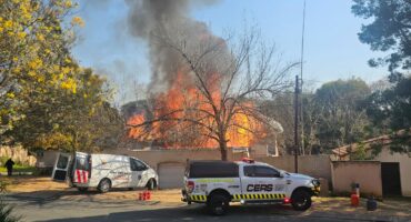 A house on the corner of Kowie and Baleta avenues in Randpark Ridge catches fire, with emergency services attending on June 25. Photo: Supplied