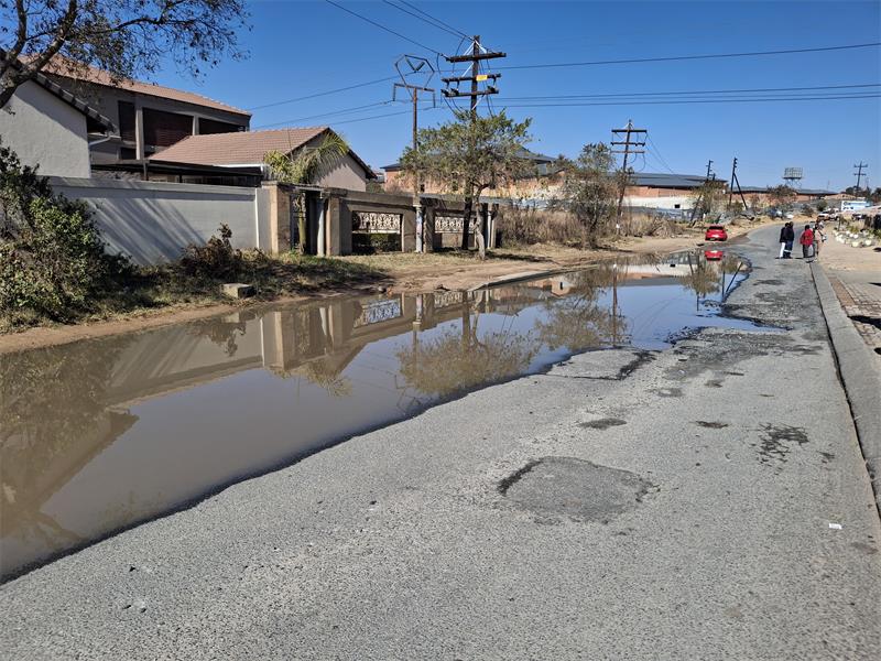 Cosmo City residents say an illegal structure, built on a wetland, has blocked drainage, flooded homes, and cracked walls, sparking a row with their ward councillor.
