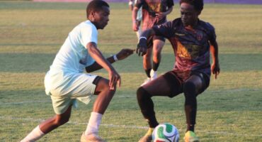 Randburg FC player David Mulunda takes on Vukona Mawila of Panorama during the Engen Knockout encounter. Photo: Mthulisi Lwazi Khuboni