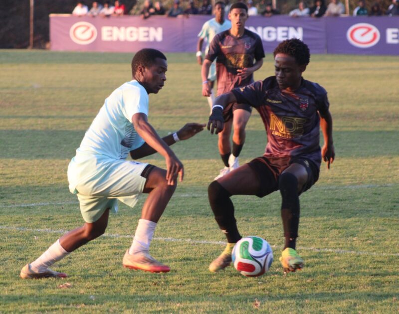 Randburg FC player David Mulunda takes on Vukona Mawila of Panorama during the Engen Knockout encounter. Photo: Mthulisi Lwazi Khuboni