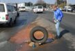 Ward 102 councillor Bea Campbell-Cloete is frustrated by a pipe burst on Bram Fischer Drive. Photo: Mthulisi Lwazi Khuboni