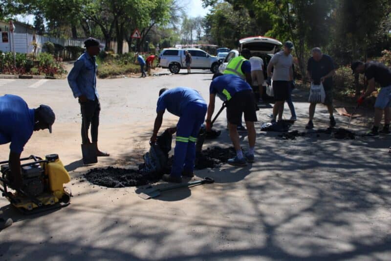 A burst pipe left Hilma Road in Bordeaux South riddled with potholes, but residents and Ward 102 councillor Bea Campbell-Cloete have now teamed up to fix them.