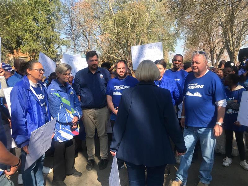 DA protesters gathered at the Pikitup Randburg depot, demanding action over waste collection issues in the area.