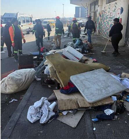 Crum officers clean up the streets in Randburg's central square as part of an intensified clean-up operation led by Crum Region B.Photo: Supplied