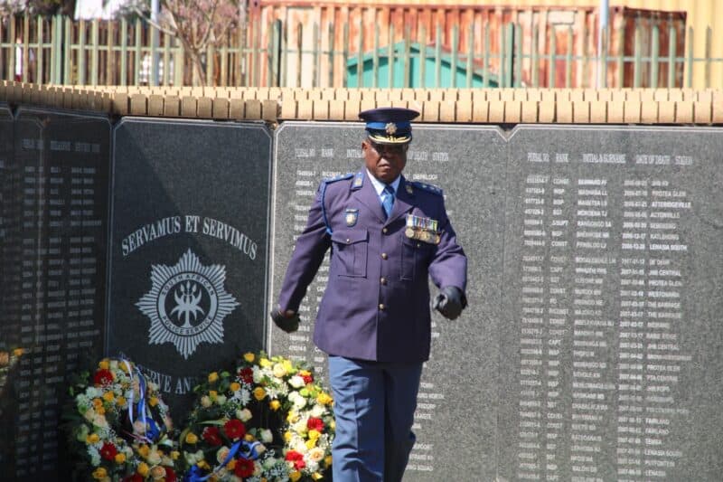 Gauteng Acting Provincial Commissioner Major General Fred Kekana pay tribute to members killed in the line of duty during the 2025/26 financial year at Linden Police Station. Photo: Mthulisi Lwazi Khuboni