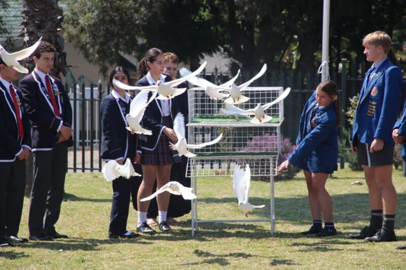 Local school learners release white doves to pay tribute to members killed in the line of duty during the 2025/26 financial year at Linden Police Station. Photo: Mthulisi Lwazi Khuboni