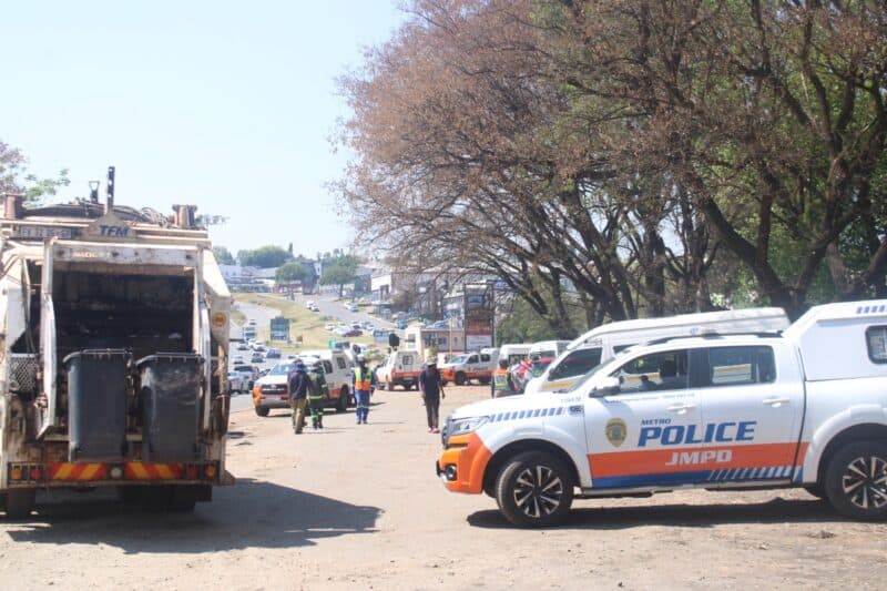 City entities conduct a high impact service delivery programme under the CR Swart Drive bridge. Photo: Mthulisi Lwazi Khuboni