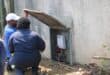 City Power officials check the wiring and metering of an electricity connection at a property in Ferndale, one of several checks carried out during the September 17 multi-agency operation in Ward 102. Photo: Nkazimulo Ncube